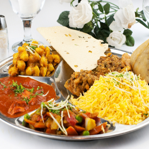 Kerala Thali - South Indian meals platter with rice, curries and roast at Kerala Restaurant Edmonton