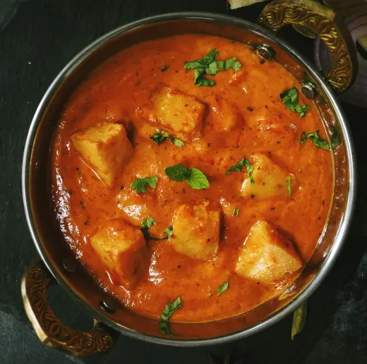 Paneer butter masala with soft paneer in creamy tomato gravy at Kerala Restaurant Edmonton