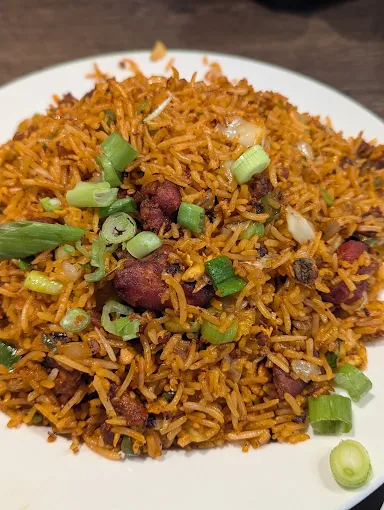 Indo-Chinese chicken fried rice with spring onions at Kerala Restaurant Edmonton
